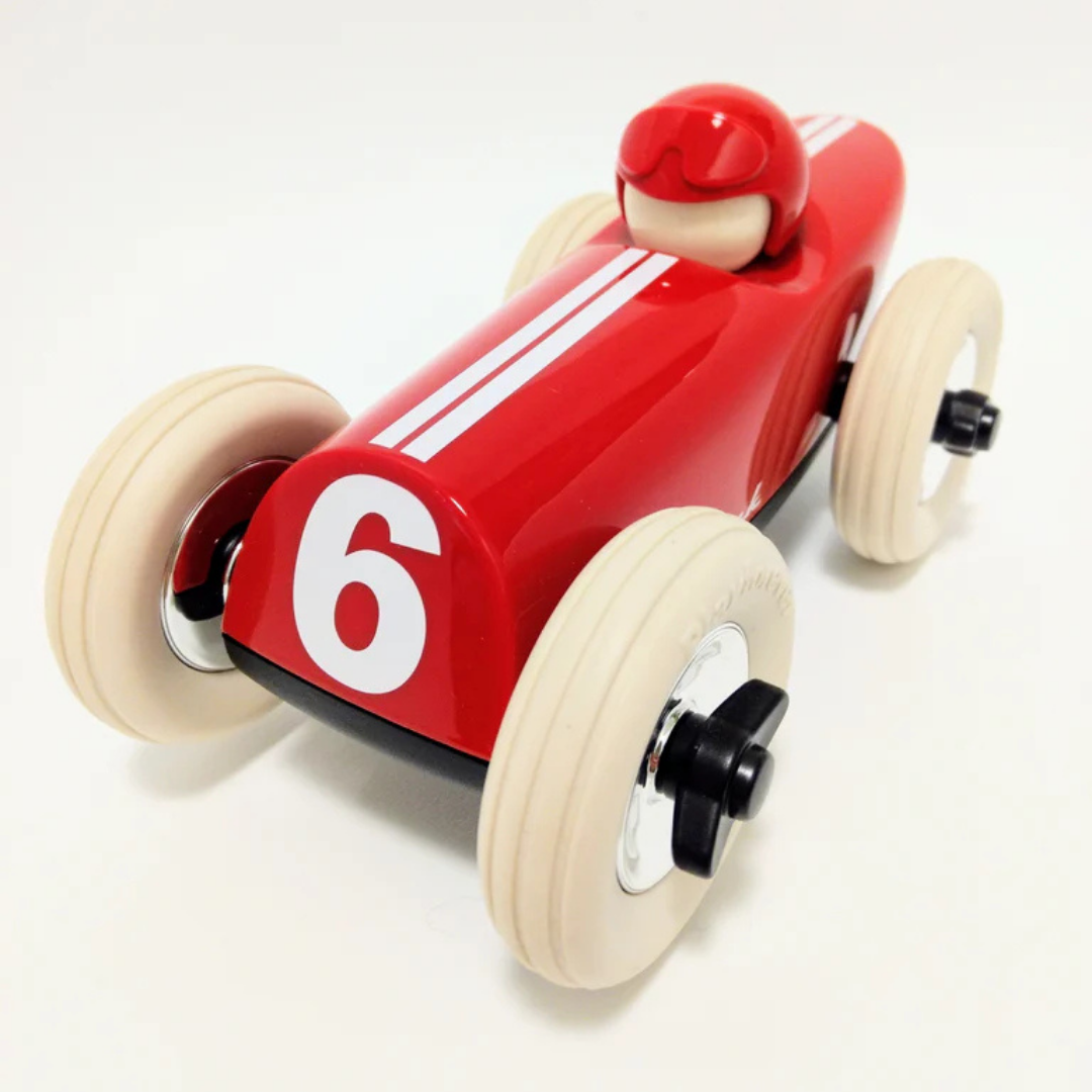 Wooden red racecar with the number 6 on the front.