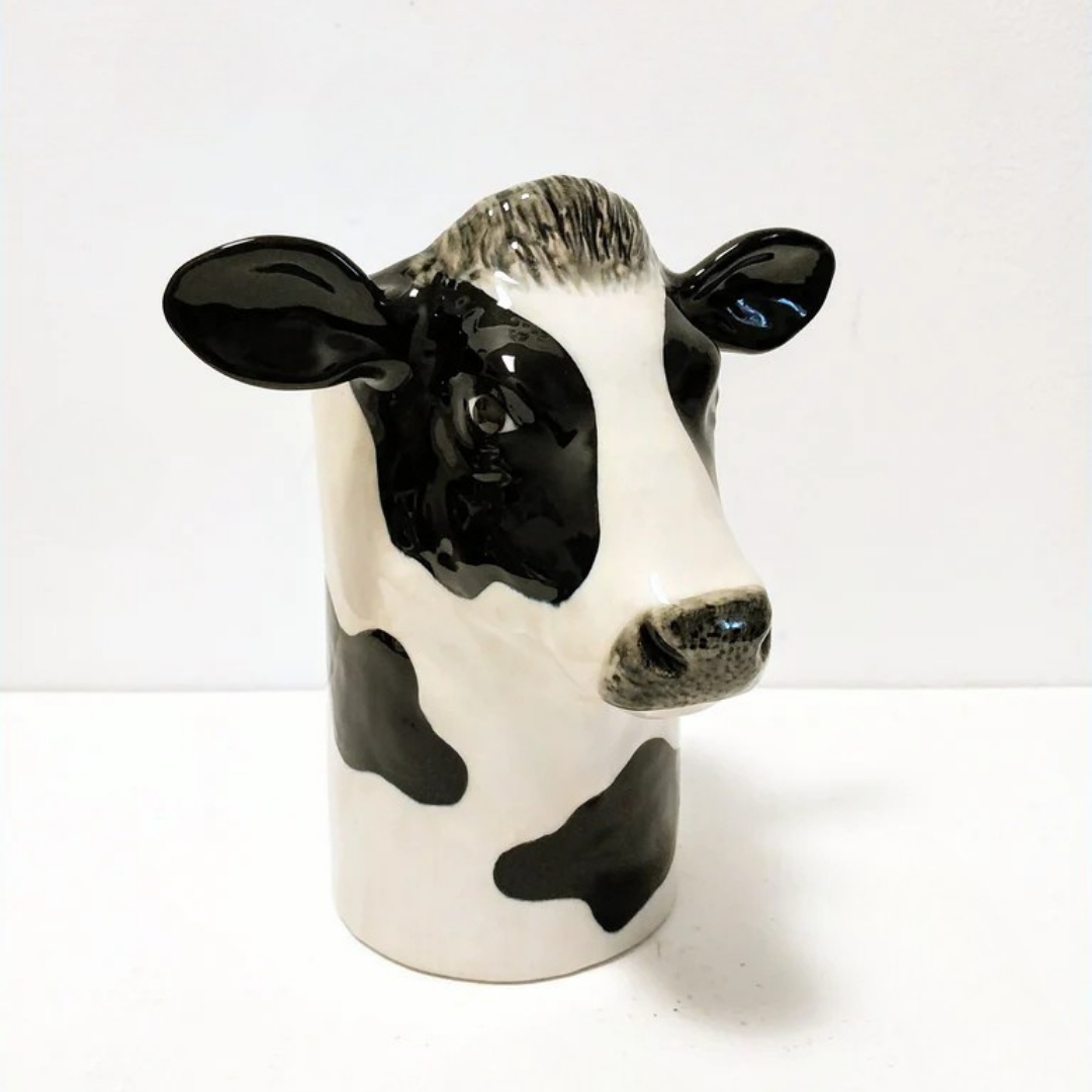 Ceramic Utensil Pot that looks like a cow.