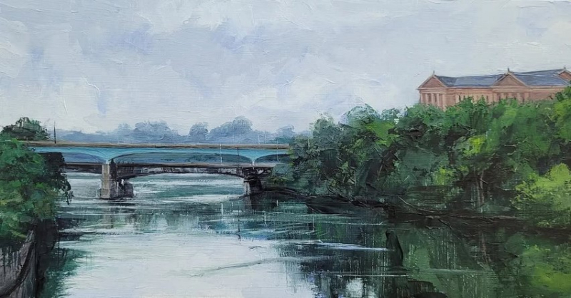 This impressionist painting depicts a scenic view of the Schuylkill River in Philadelphia, featuring bridge with the Philadelphia Museum of Art visible on the right bank.