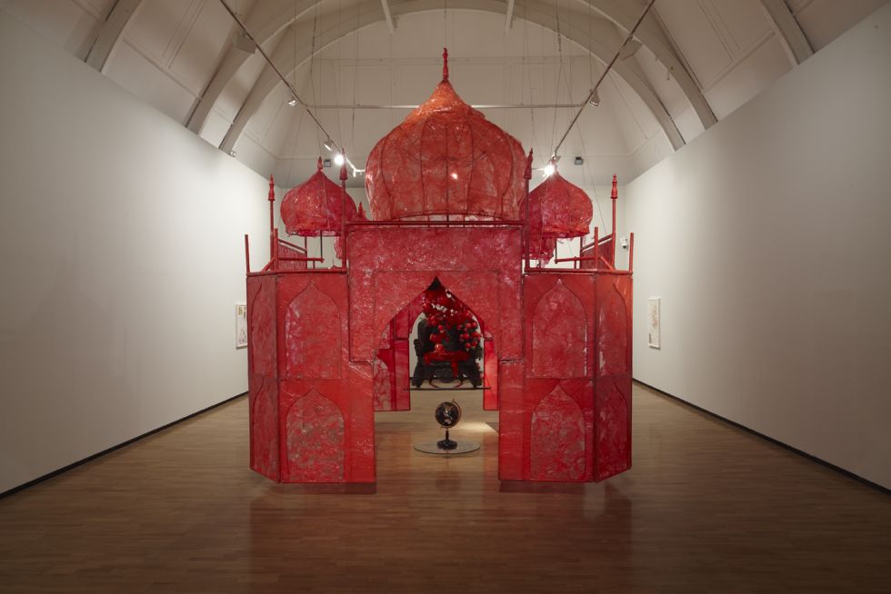 Rina Banerjee, Take me, take me, take me…to the Palace of love, 2003, plastic, wood chair, steel and copper framework, floral picks, foam balls, cowrie shells, quilting pins, moss, stone globe, glass, synthentic fabric, fake birds, 13 x 13 x 18 ft.