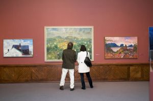 Members viewing paintings in HLB