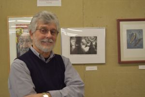 Instructor Toni Rosati with his prints