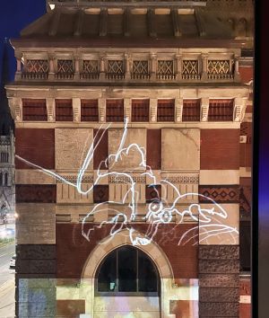 screengrab of the Philadelphia Animation Ensemble projected onto the Historic Landmark building