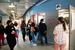 Tour group looks into metal shop