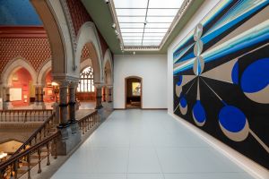Installation image of the large geometric painting by Eamon Ore-Giron