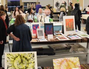 People at the print sale