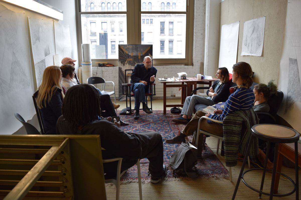 Sculpture professor Rob Roesch with students.