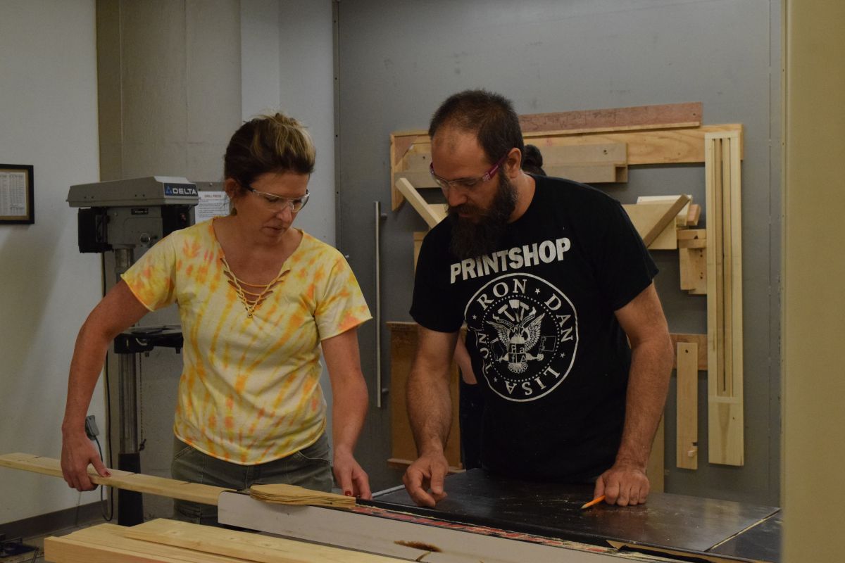 MFA student Suzanne Morgan works in the wood shop with PAFA sculpture manager John Grieg