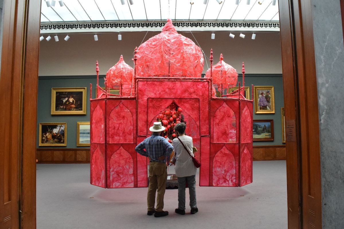 Museum visitors enjoy an early peek at Banerjee's installation.