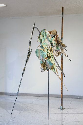 Precarious Windbreak 2019 H114 ½ x 67 x 71 inches polyurethan resin concealed iron rust, aluminum powder and copper corrosion on boiled and beaten mulberry bark (kozo) and cotton pulp, cane, steel, bronze