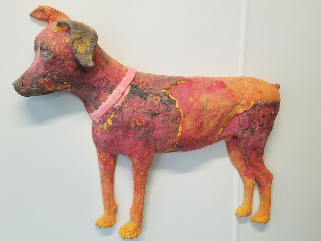 3-dimensional dog made out of colorful paper