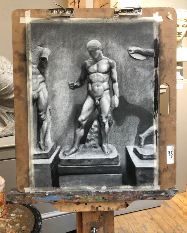 Graphite drawing of three male nude figures on easel