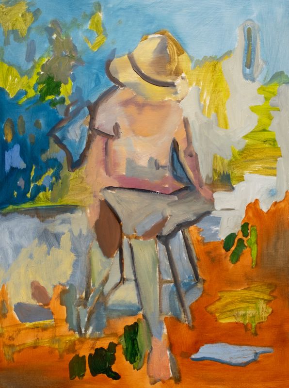seated figure with hat on colorful background