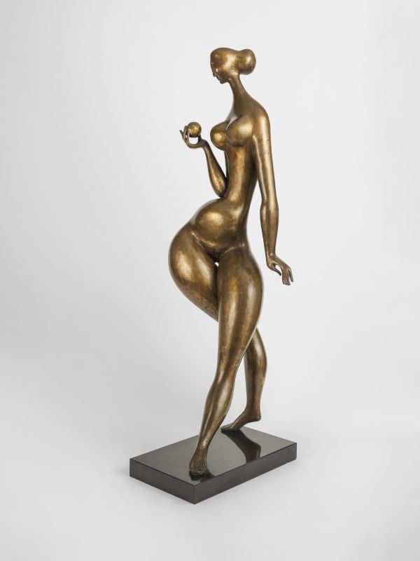 A bronze sculpture of a female figure. 