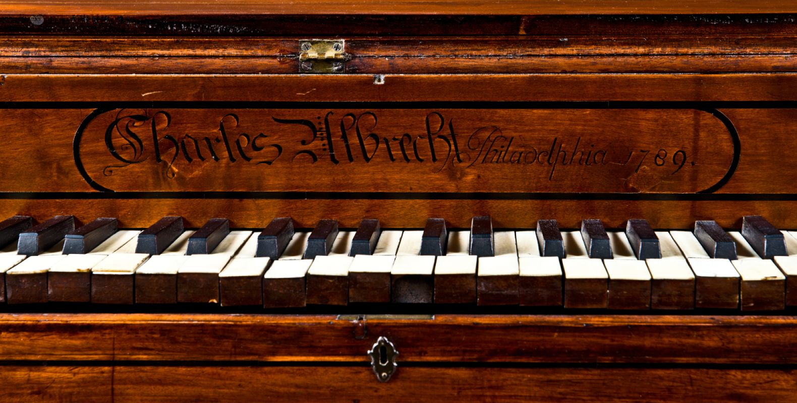 Up close view of the keys of a pianoforte.