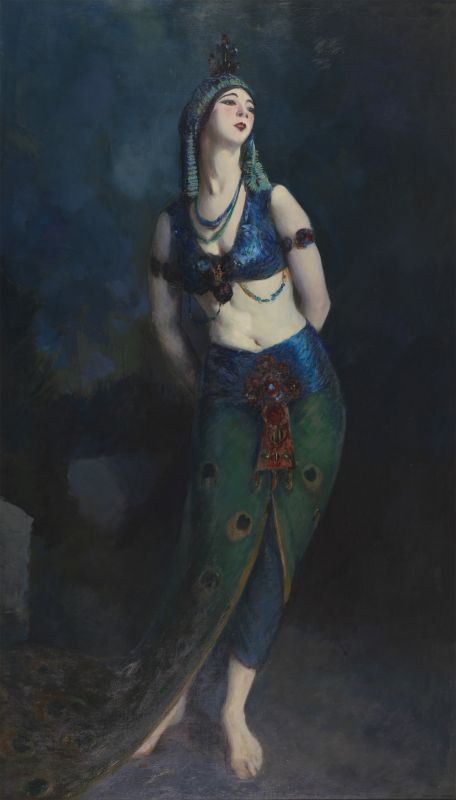 Robert Henri captures dancer Ruth St. Denis in a vibrant peacock-inspired costume and pose, reflecting her theatrical choreography and the exoticism of early modern dance.