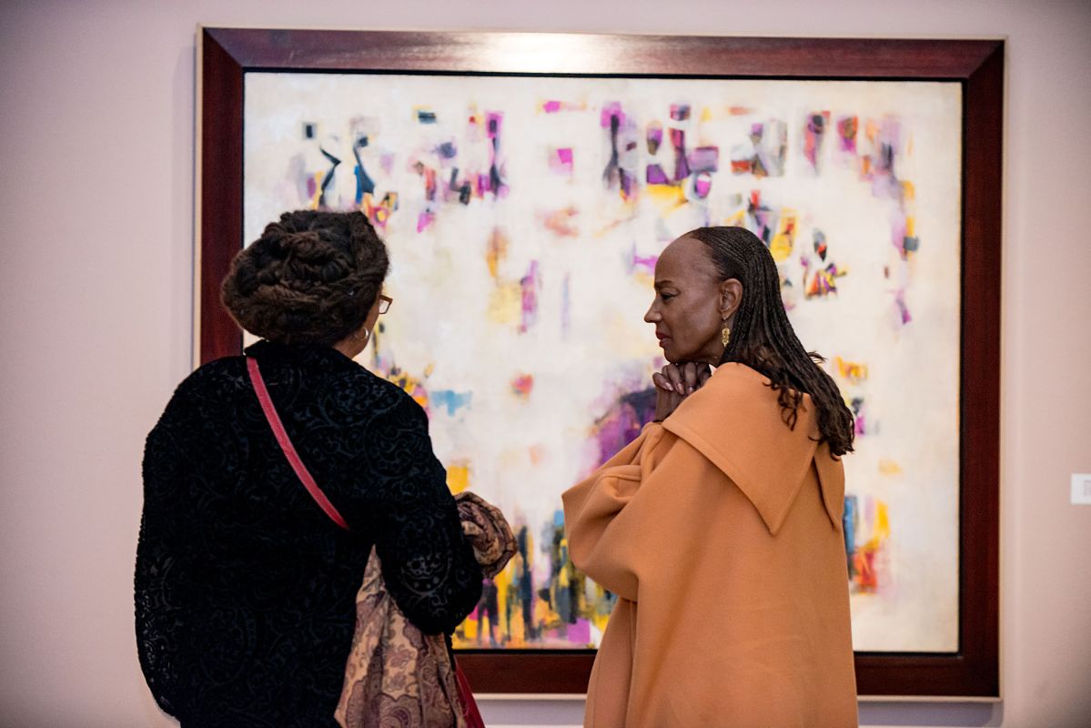 photo from the exhibition reception for "Procession: The Art of Norman Lewis".