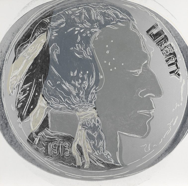 A close-up image of an Indian Head Nickel coin from 1913, featuring the profile of a Native American man with feathers in his hair and the word "LIBERTY" inscribed vertically on the right.