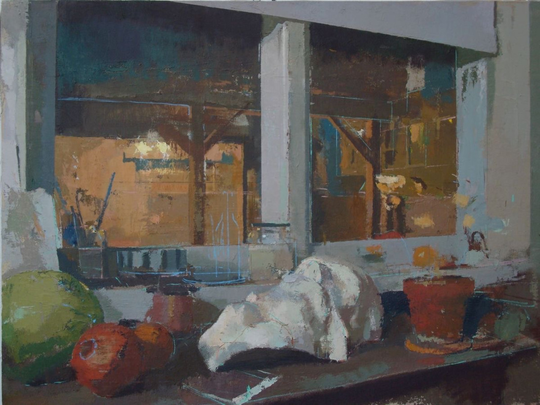 An oil painting depicts a cluttered windowsill with a plaster cast, potted plant, and fruit, looking out through large windows into a softly lit workshop interior.