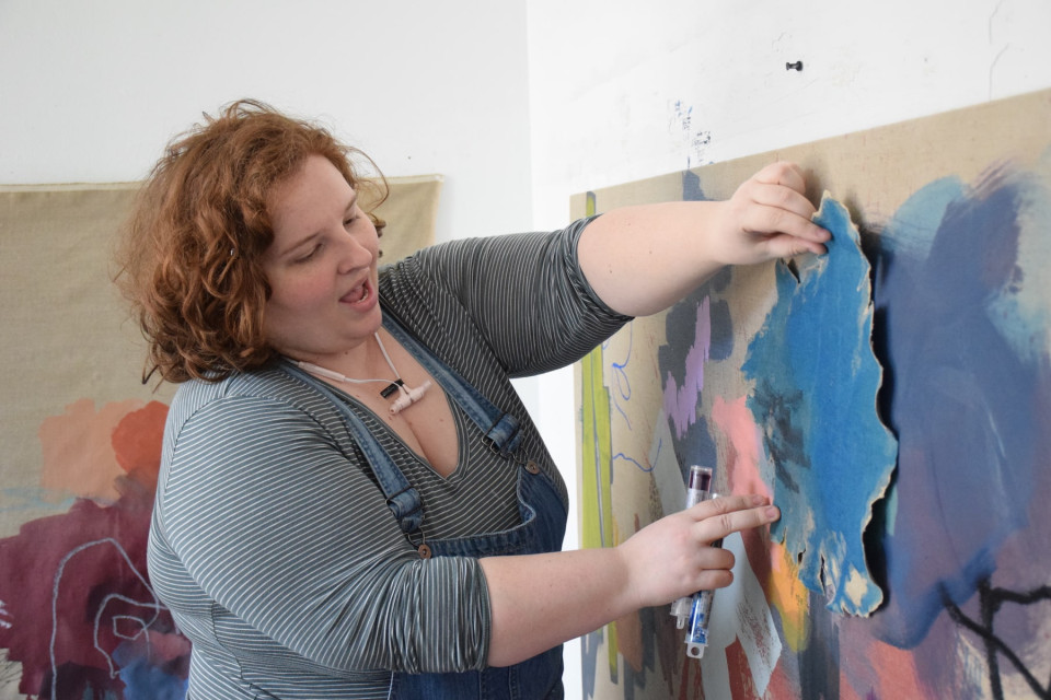 BFA student Ash Bob at work in their studio.