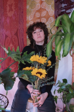 photo of emma holding sunflowers