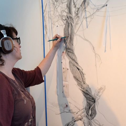 Anne Greenwood (MFA '19), working in the studio.