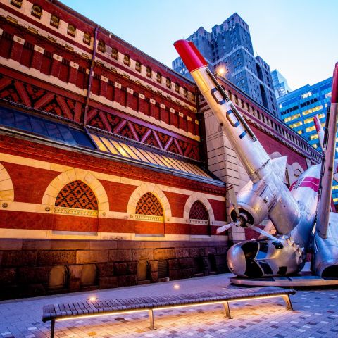 Sculpture of plane in outdoor plaza