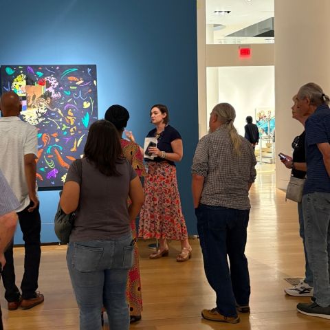 Leah Triplett giving a tour of Villalongo to a group of people