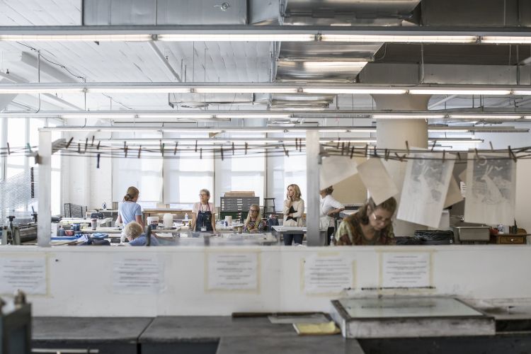 students at work in the print shop