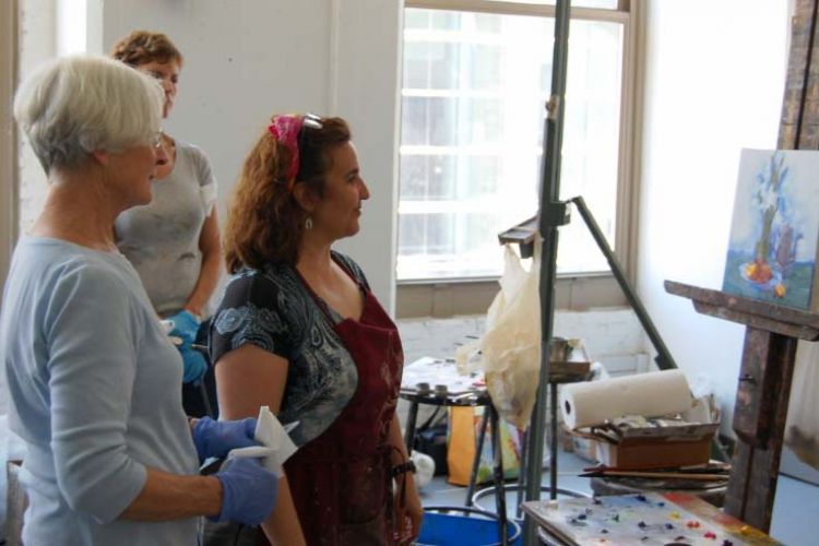  Christine Lafuente teaching a group of students