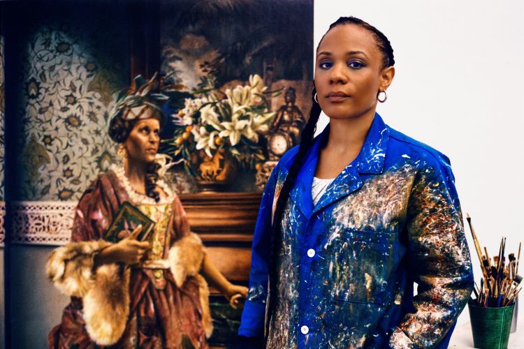Image of the artist with her paintings, photo from Vogue magazine (Photographed by Anton Corbijn, Vogue, October 2018 / Painting: Elizabeth Colomba. Winter, 2017. Oil)