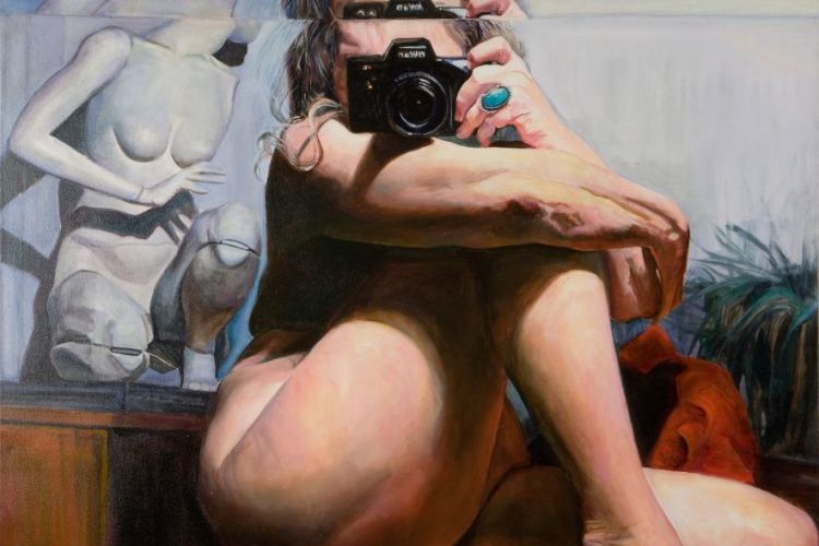 Image of Joan Semmel, photographing her naked body in a mirror