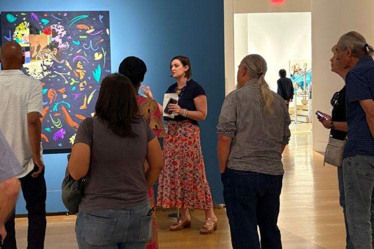 Leah Triplett giving a tour of Villalongo to a group of people