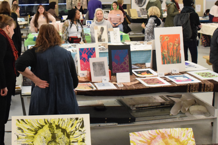 People at the print sale