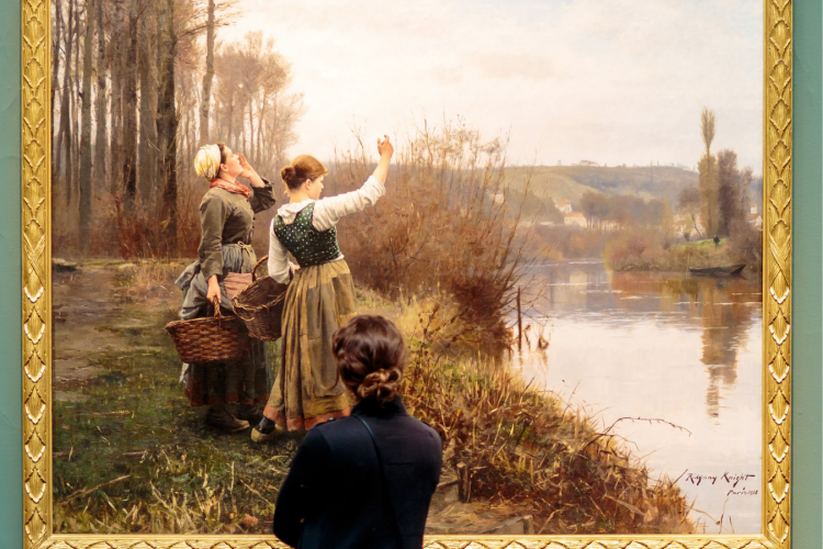 Person looking at a painting
