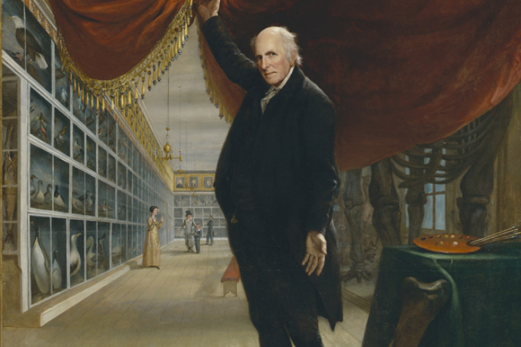 An elderly man in a black suit lifts a heavy red velvet curtain to reveal a long museum gallery filled with rows of taxidermy birds and a large mastodon skeleton.