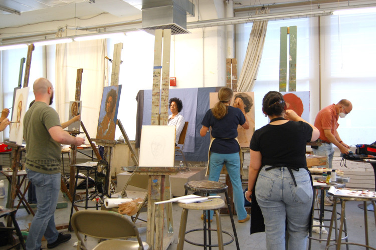 Students in a Portrait Painting class.