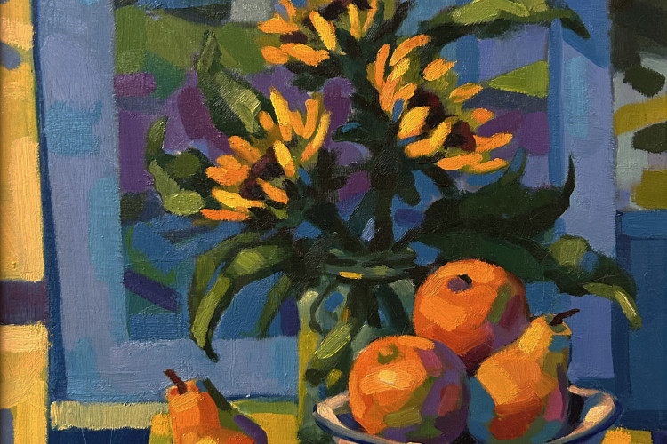 A vibrant Fauvist-style still life painting depicting a vase of bright yellow sunflowers and a bowl of oranges and pears on a table in front of a blue-framed window overlooking a colorful landscape.