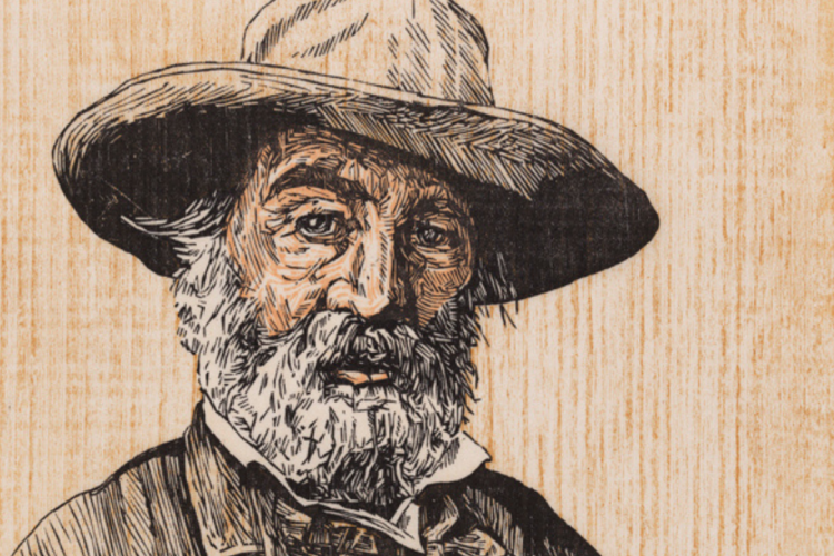 A detailed, three-color woodcut print depicts a half-length portrait of the elderly American poet Walt Whitman wearing a wide-brimmed hat and an overcoat, set against a light-colored background that prominently showcases a vertical woodblock grain texture.